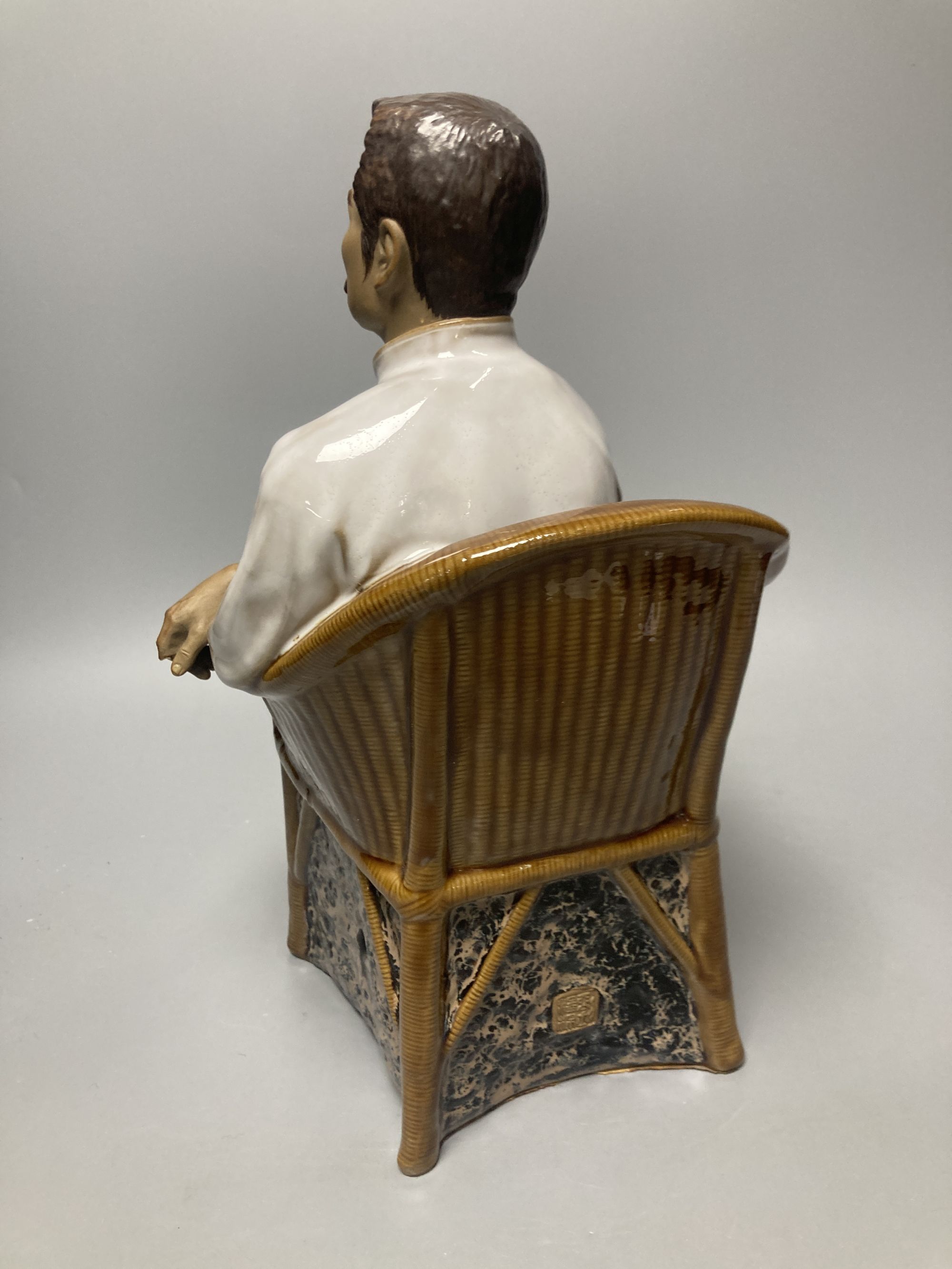 A Chinese Shiwan pottery figure of Lu Xun
